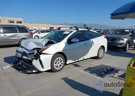 2022 Toyota Prius L из США, поврежденный, VIN JTDKAMFU9N3174887